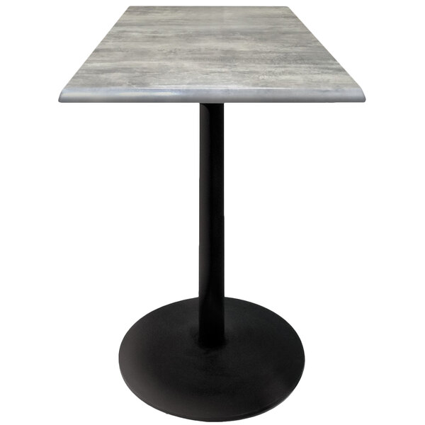 A Holland Bar Stool 30" square greystone table with a black round base.