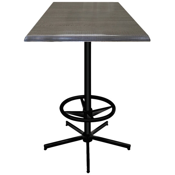 A Holland Bar Stool charcoal square bar table with a metal base.