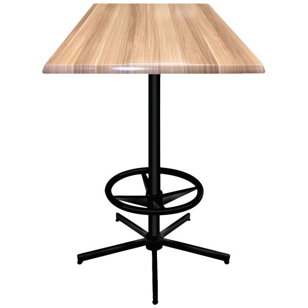 A Holland Bar Stool natural wood square bar table with a black metal base.