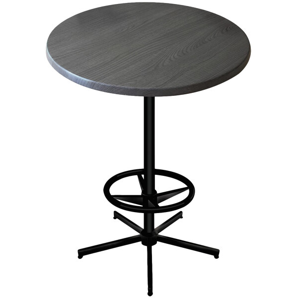 A charcoal round table with a black metal base.
