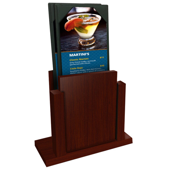 A Menu Solutions mahogany wood menu holder on a table.