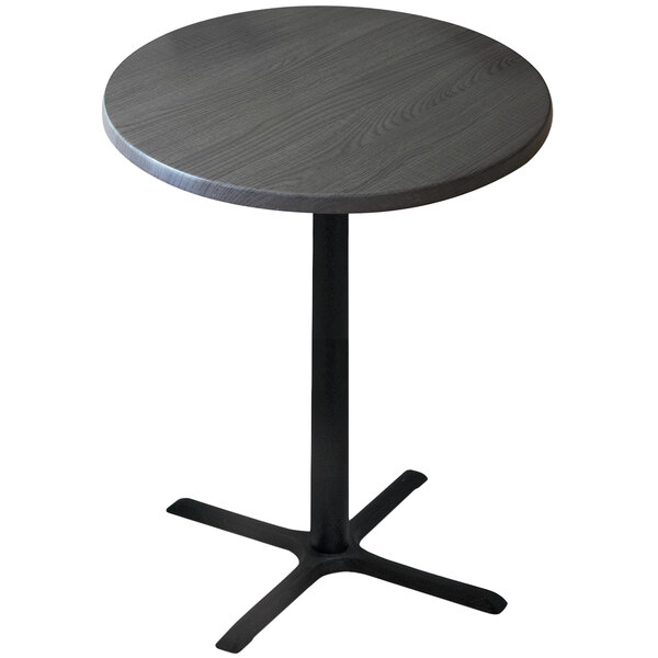 A round charcoal Holland Bar Height Table with a black metal cross base.