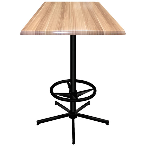 A natural wood square bar table with a black metal base.