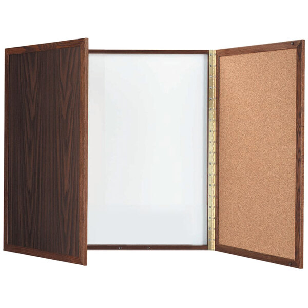 A wooden box with a white board, cork board, and wood panel inside.
