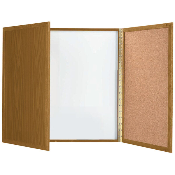 An Aarco oak laminate planning board with a cork and white board inside.