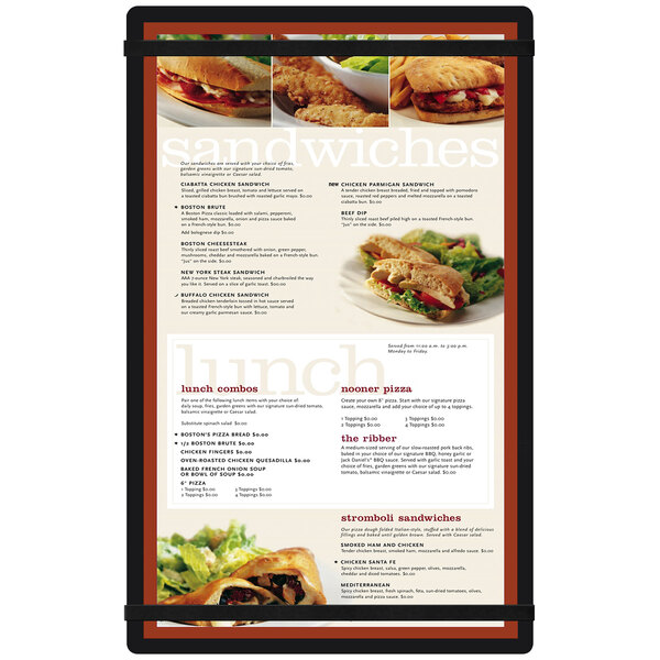 A black customizable acrylic menu board with rubber band straps displaying a sandwich and salad.