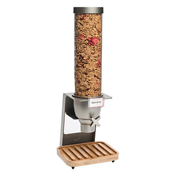 A Rosseto cereal dispenser filled with cereal on a wooden stand.
