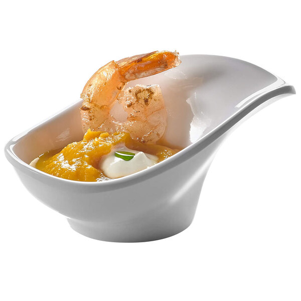 A white Rosseto melamine leaf bowl filled with shrimp and cream.