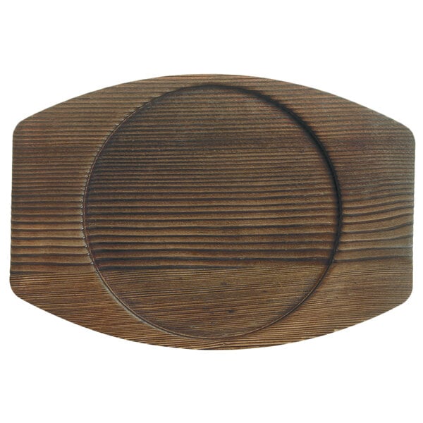 A Libbey cedar wood underliner with a circular pattern on the edge.