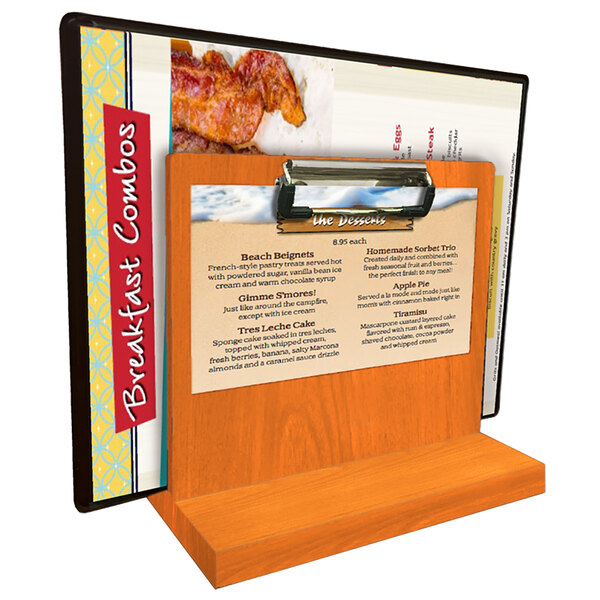 A Menu Solutions wood clipboard with a menu on it.