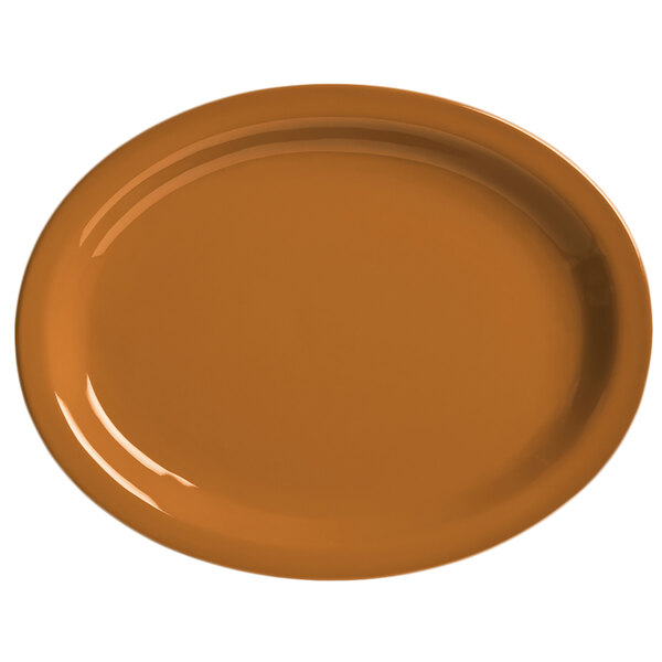 A brown oval plate with a white background.