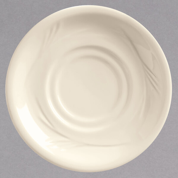 A white plate with a circular rim.