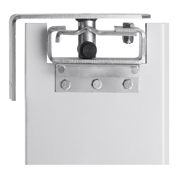 A Regency aluminum swinging traffic door with a metal plate and window.