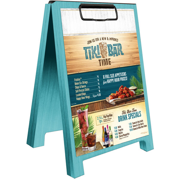 A sky blue wooden Menu Solutions sandwich menu board tent on a table.
