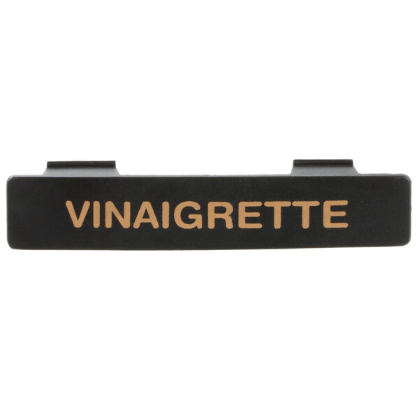 A black rectangular Tablecraft dispenser tag with orange "Vinaigrette" text.