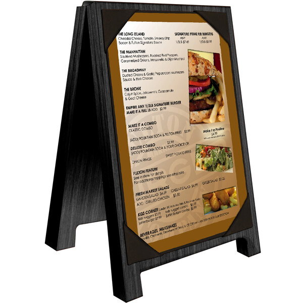 A black wood Menu Solutions table tent menu board with picture corners holding a menu with a picture of a burger.