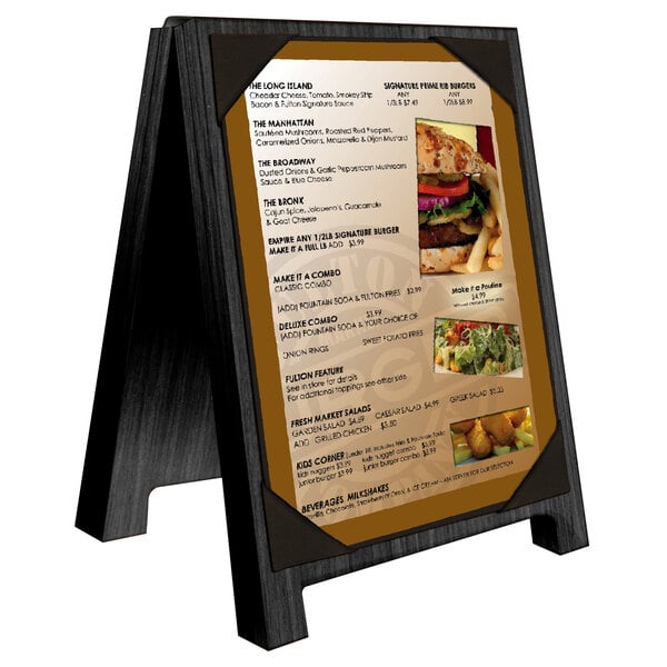 A black wood Menu Solutions table tent with a picture of a burger on the menu.