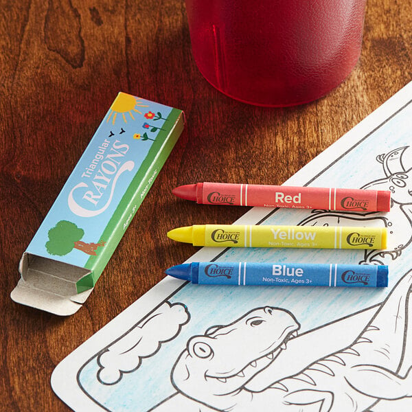 A print box of Choice triangular kids' restaurant crayons on a table.