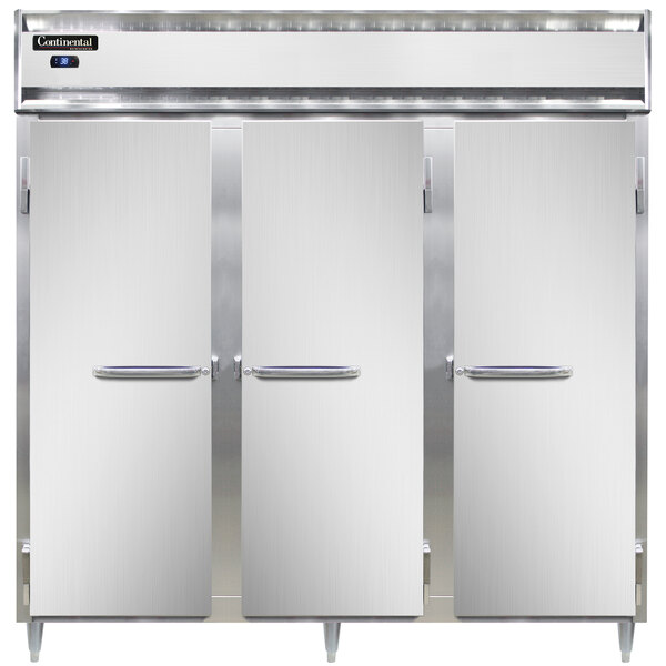 The open stainless steel doors of a Continental DL3R reach-in refrigerator.