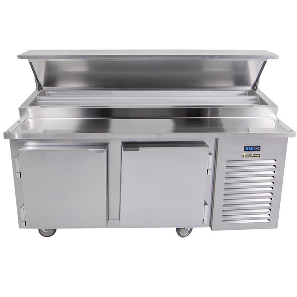 A Traulsen stainless steel refrigerated pizza prep table with two doors.