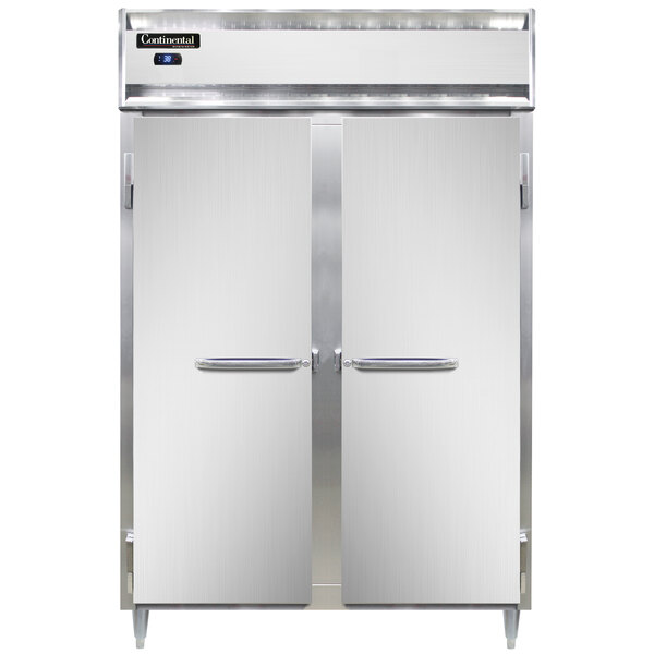 A white Continental pass-through refrigerator with two stainless steel doors and silver handles.