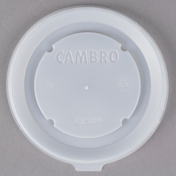 A white plastic Cambro lid with white text saying "Cambro"