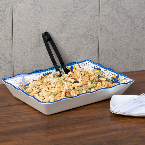 A white GET Melamine tray with a plate of pasta, a fork, and a knife on it.