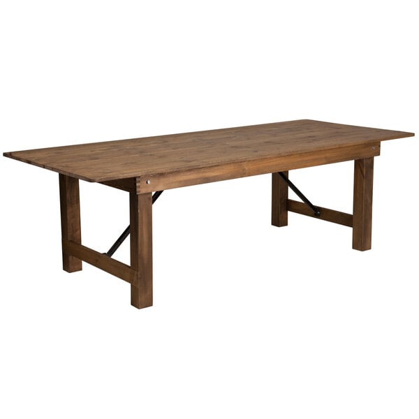 A Flash Furniture solid pine folding farm table with a metal base.