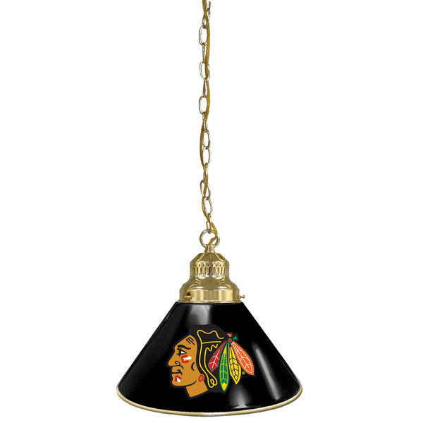 A black and gold pendant light with the Chicago Blackhawks logo on it.