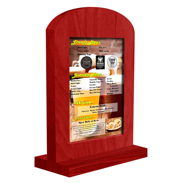 A wooden Menu Solutions arched wood menu tent on a table.