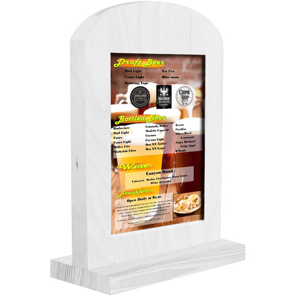 A white wooden Menu Solutions arched table tent with a menu on it.