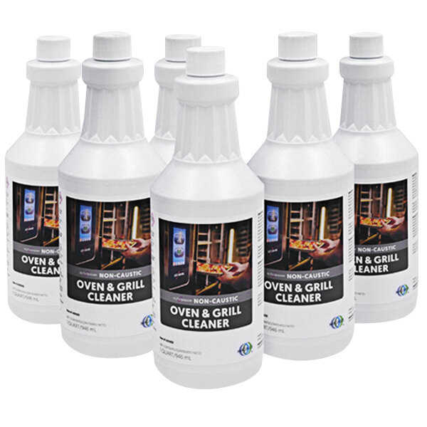 A group of white Alto-Shaam Greaselift oven cleaner bottles with black labels.