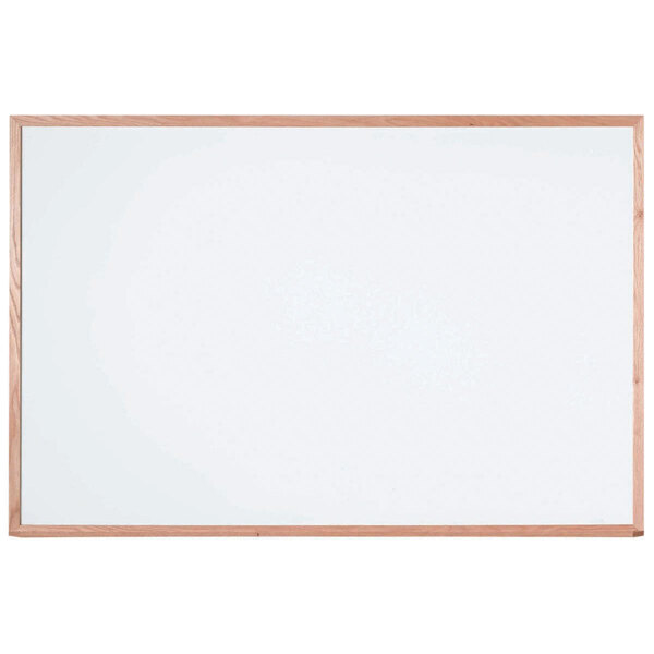 A white board with a white porcelain enamel surface and a wood frame.