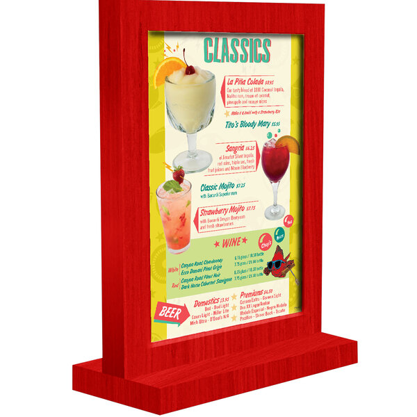 A white wood menu tent with a berry frame showing a drink menu.