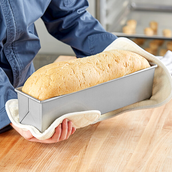 A loaf of bread in a Chicago Metallic pullman bread loaf pan.