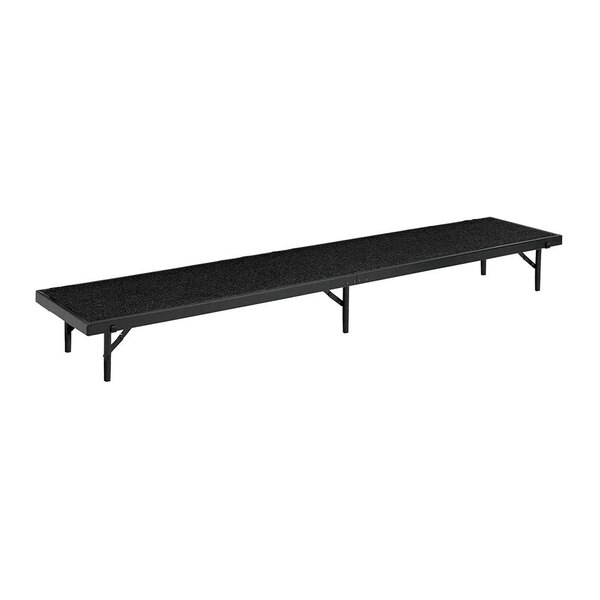 A National Public Seating black carpeted portable riser with tapered legs.