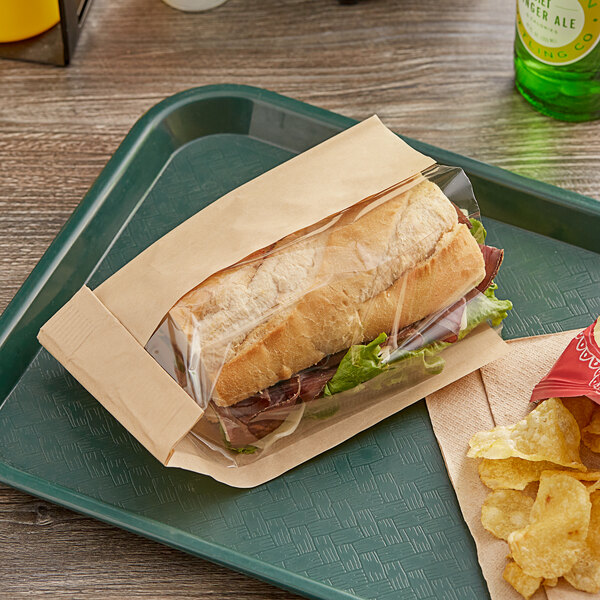 A sandwich in a Bagcraft Dubl View ToGo! paper bag on a tray.