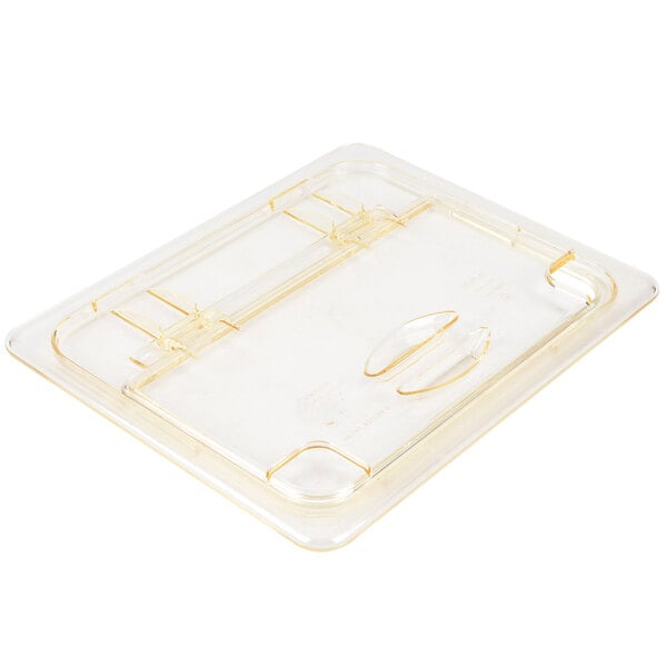 A clear plastic tray with a clear lid and a spoon notch.