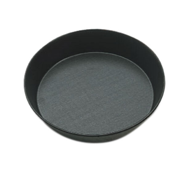 A black round Matfer Bourgeat cake pan with a black surface.