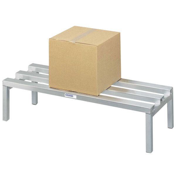 A brown box on a Channel aluminum dunnage rack.