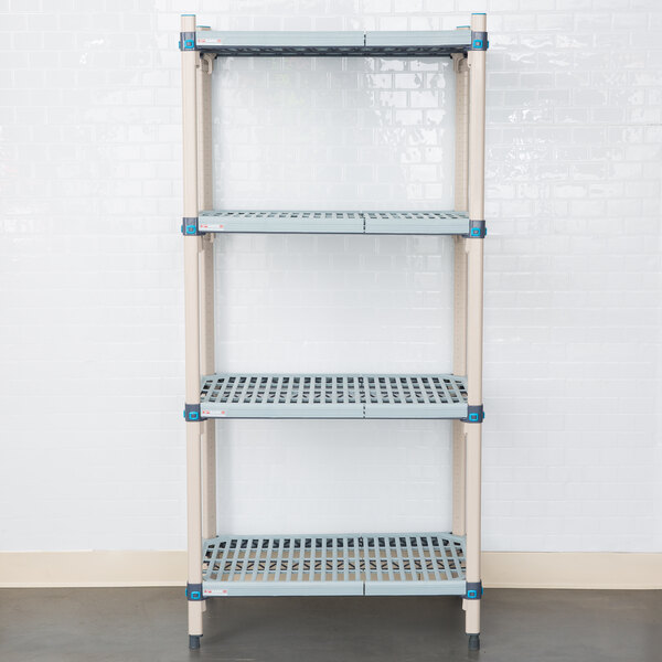 A white MetroMax Q shelving unit with blue shelves and wheels.