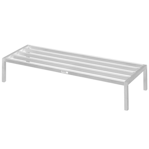 A white metal Channel dunnage rack with metal legs.