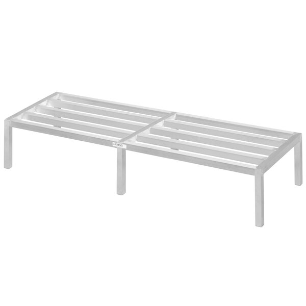 A white metal platform with slats on four legs.