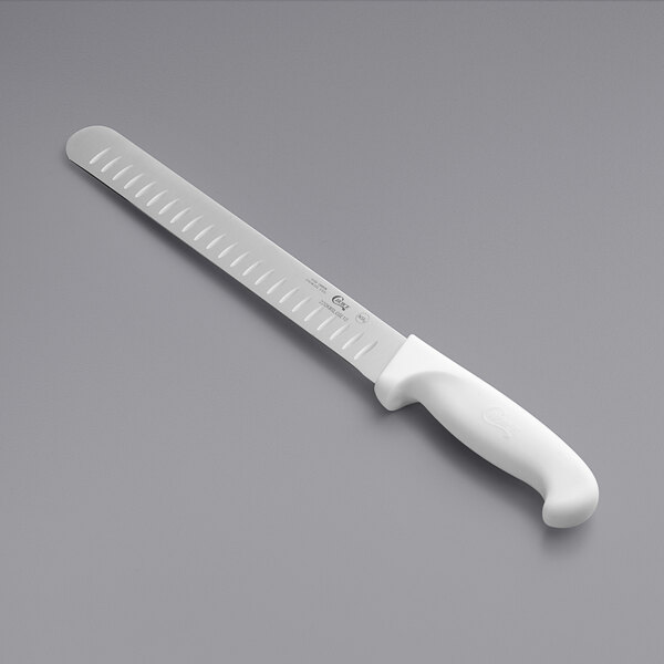 A white Choice slicing knife with a white handle and Granton edge.
