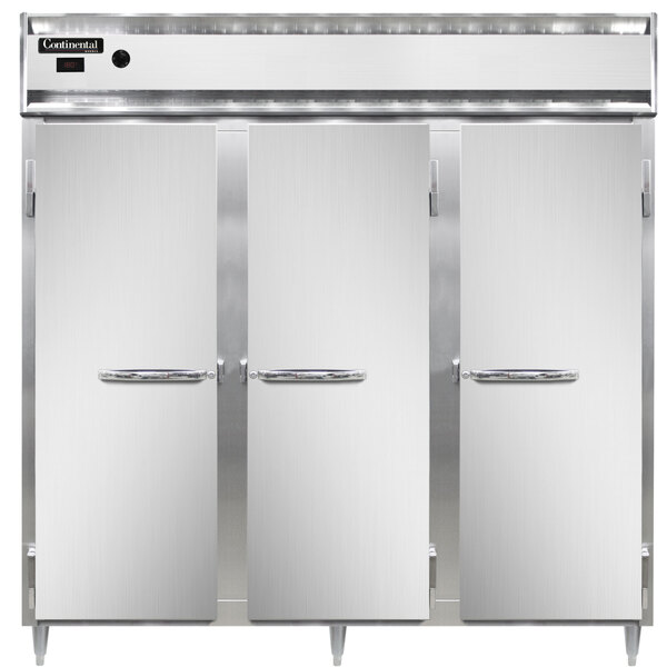A white Continental reach-in heated holding cabinet door with a handle.