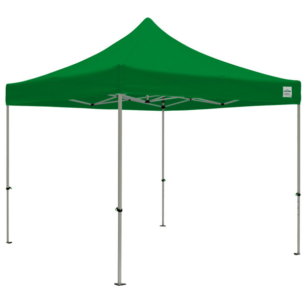 A green Caravan Canopy instant tent with poles.