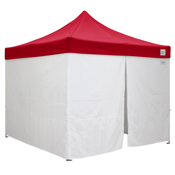 A red Caravan Canopy tent with white walls and a white top.