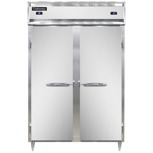 A Continental DL2RF dual temperature reach-in refrigerator/freezer with two open stainless steel doors.