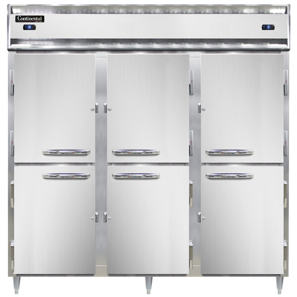 A white cabinet with three stainless steel doors open with silver handles.