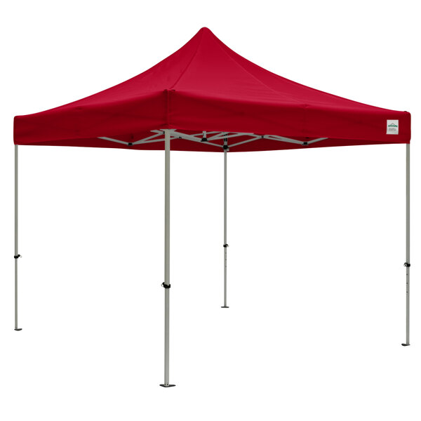 A red Caravan Canopy Displayshade tent with white poles.